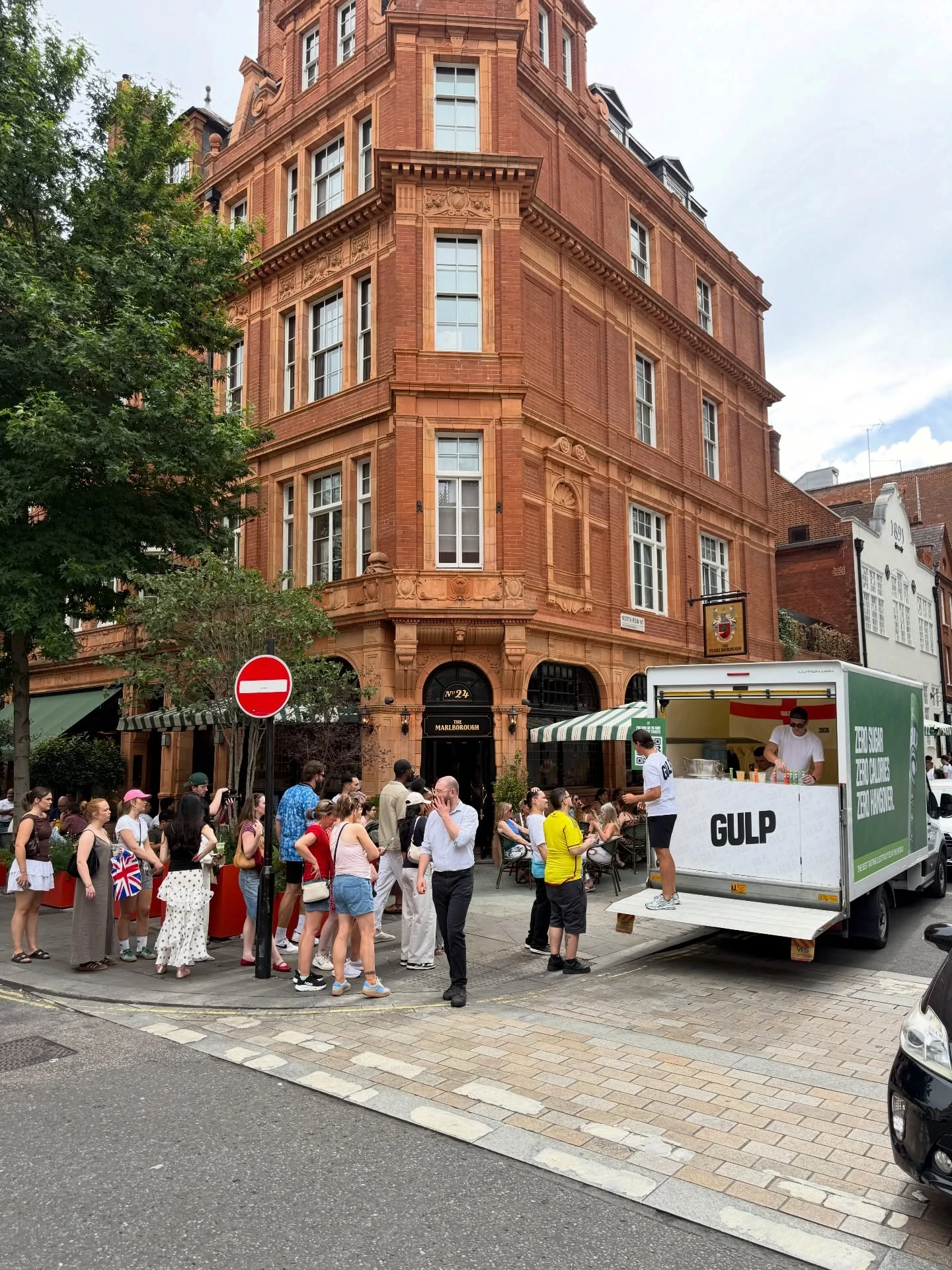 GULP sampling van serving drinks to a crowd outside The Marlborough